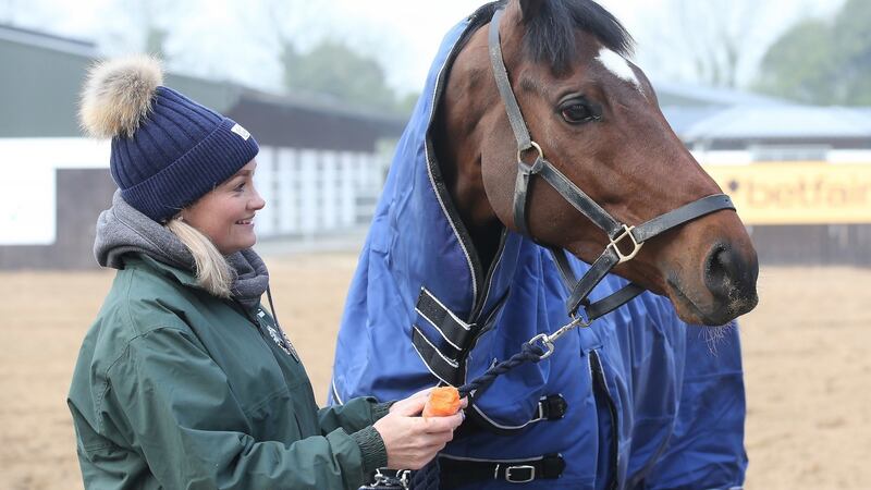 Handout photo provided by The Jockey Club of 2019 Grand National Winner Tiger Roll and   Louise Magee. Photograph:  John Grossick/The Jockey Club.