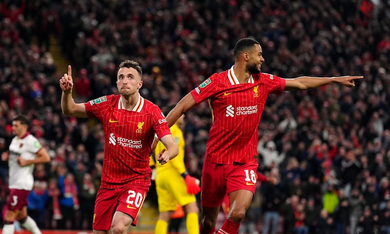 Liverpool's Diogo Jota (left) celebrates with team-mate Cody Gakpo. Photograph: Peter Byrne/PA