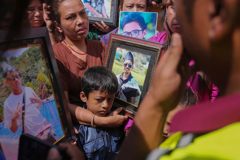 Relatives of Gen Z protesters who were shot dead during  anti-corruption protests call for justice. Photograph: Ritesh Shukla/Getty Images