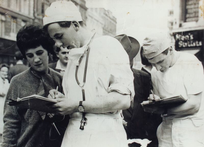 Eoin O’Brien and Tom McDonald collecting names for a charitable petition.