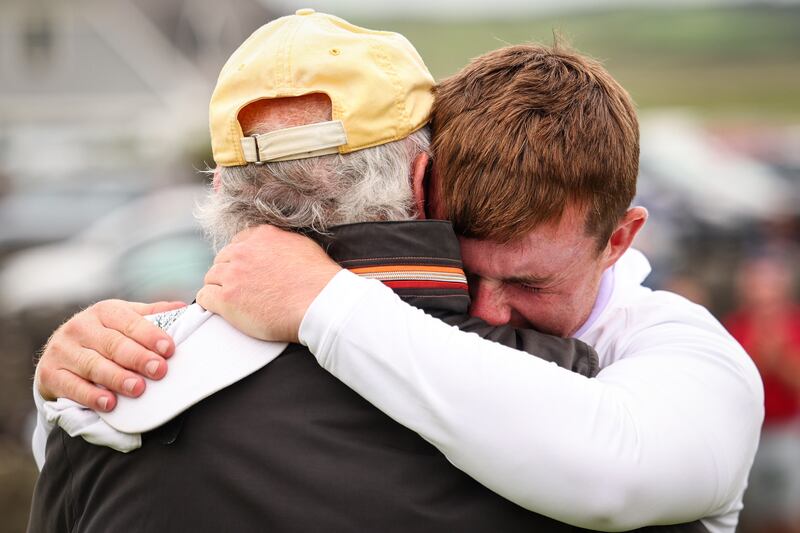 Jonathan Keane celebrates after winning the South of Ireland with the last local winner JD Smyth. Photograph: Ben Brady/Inpho
