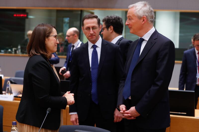 Hungarian finance minister Mihaly Varga (centre) with Polish finance minister Magdalena Rzeczkowska and French finance minister Bruno Le Maire at the start of an Economic and Financial Affairs Council at the European Council in Brussels. Photograph: EPA