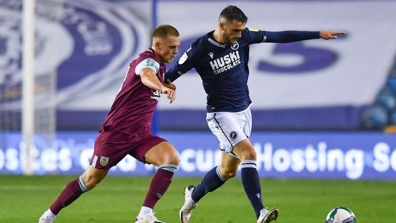Josh Benson of Burnley battles for possession with Troy Parrott of Millwall during the Carabao Cup third-round match  at The Den. Photograph: Ben Stansall - Pool/Getty Images