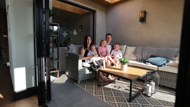 Sinéad Ní Mhurchadha and Bryn Griffiths, Nia (1) and Saren (4) and Rhys (6), in Goatstown, Dublin 14. Photograph: Nick Bradshaw