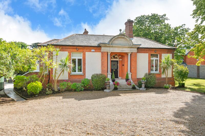 Front door with stained glass designed by Beatrice Elvery. Photographs: Ronan Melia