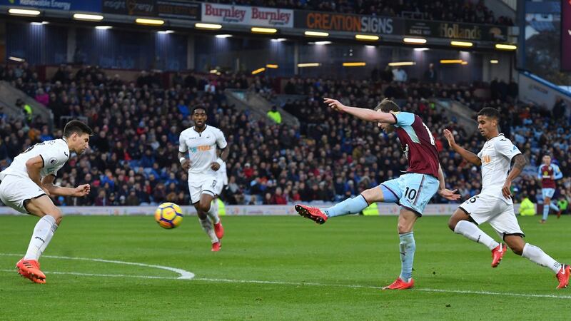 Burnley’s Ashley Barnes scores his side’s second goal of the game during the Premier League match against Swansea City at Turf Moor. Photograph:  Anthony Devlin/PA Wire