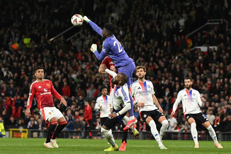 Manchester United's Andre Onana punches the ball clear. Photograph: Oli Scarff/AFP via Getty