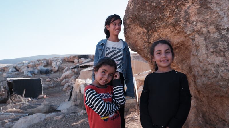 Sisters Waad and Yasmin (front) and their cousin Jihan (back), who hope to attend the local school in Ein Samiya. Photograph: Jade Wilson