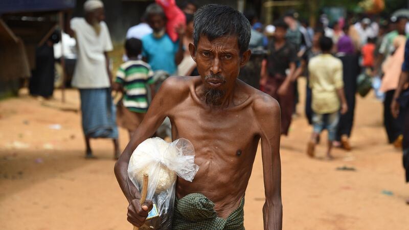 A Rohingya refugee walks at the camp of Kutupalong in Bangladesh. Photograph: Dominique Faget/AFP/Getty Images