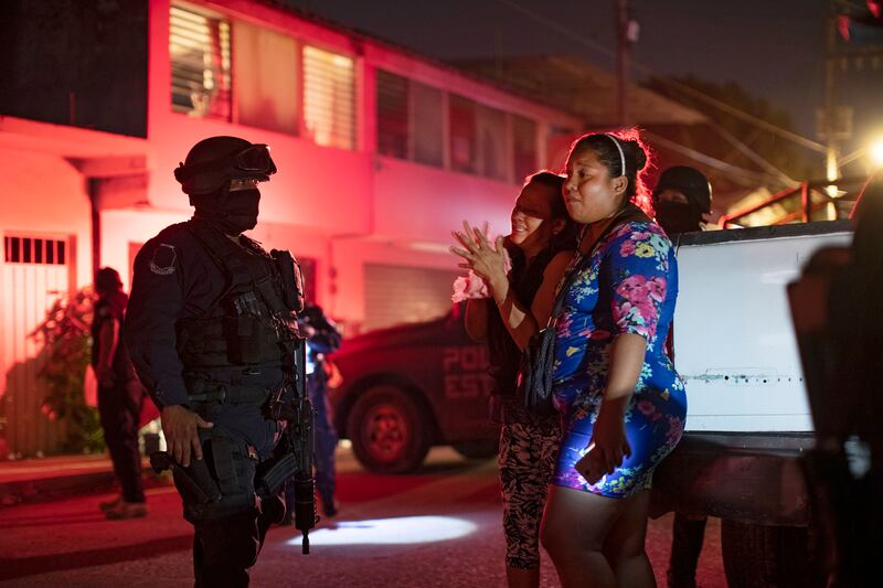 A murdered taxi driver’s wife and daughter at the crime scene in Acapulco, Mexico on December 12th, 2018. More killings take place in Mexico today than at any time in the last two decades, when the nation started collecting homicide statistics. Photograph: Tyler Hicks/The New York Times
