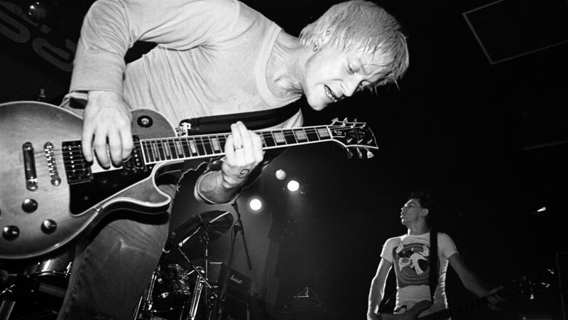 Guitarist Garret Lee (aka record producer Jacknife Lee) of Compulsion performs on stage in 1994. File photograph: Martyn Goodacre/Getty Images