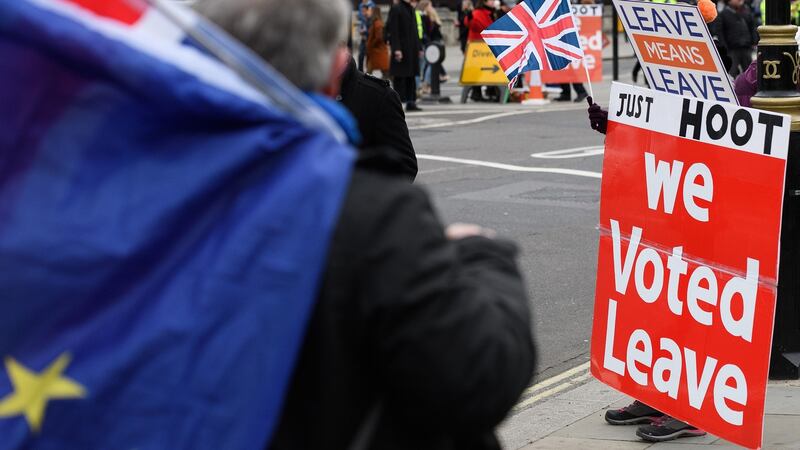 A Remain and Leave campaigner outside the House of Commons. Photograph: Leon Neal/Getty Images