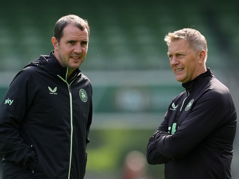 Republic of Ireland manager Heimir Hallgrimsson (right) and John O'Shea during a training session at the Aviva Stadium. Photograph: Brian Lawless/PA 