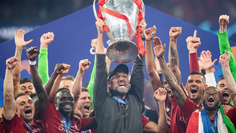 Jurgen Klopp, manager of Liverpool, celebrates with the Champions League trophy after winning the UEFA Champions League final between Tottenham Hotspur and Liverpool at Estadio Wanda Metropolitano in Madrid.Photograph: Matthias Hangst/Getty Images