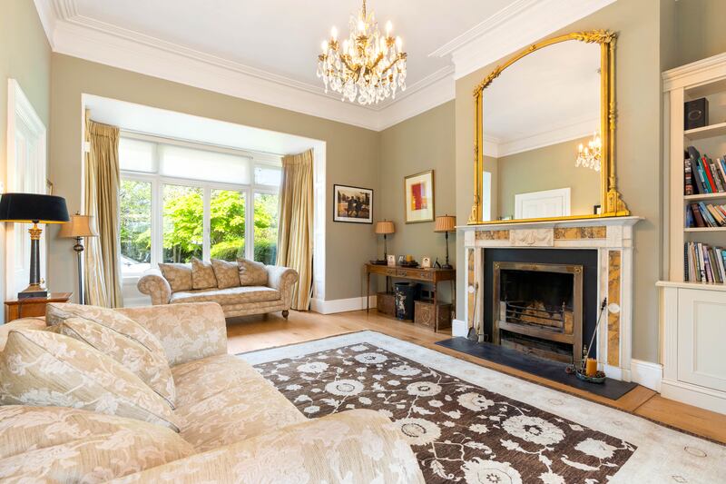 Drawing room with box bay window and marble fireplace