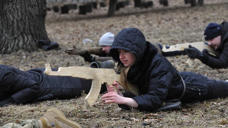 A Ukrainian woman attends a military training for civilians a week before Russia invaded Ukraine. Photograph: Sergei Chuzavkov/SOPA Images/LightRocket via Getty Images