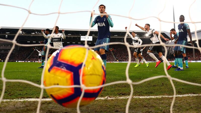 Tottenham’s Fernano Llorente  scores an own goal to give Fulham the lead at Craven Cottage. Photograph: Clive Rose/Getty