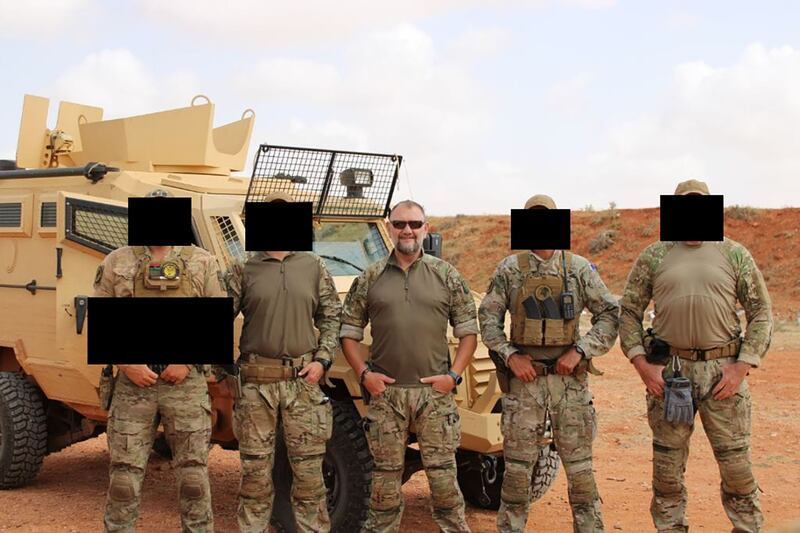Danny Cluskey, centre, of Irish Training Solutions, a company set up by former Army Rangers Wing members, who trained the 166 Infantry Brigade of the Libyan National Army last year, with colleagues