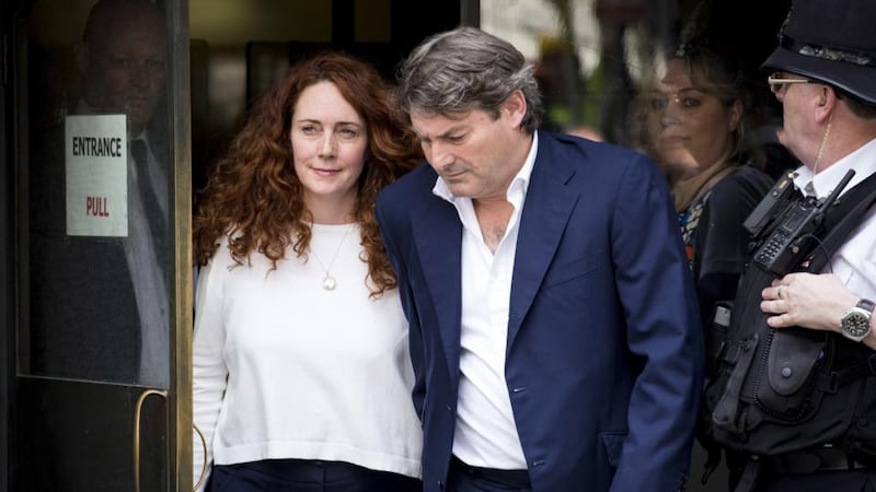 Rebekah and Charlie Brooks leave the Old Bailey in London yesterday after being cleared of all charges. Photograph: John Phillips/Getty Images