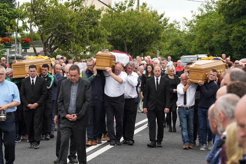 Pallbearers carry the three coffins at the funeral for Vanessa Whyte and her children, Sara and James, at Church of the Immaculate Conception in Barefield, Co Clare. Photograph: Noel Sweeney/PA Wire