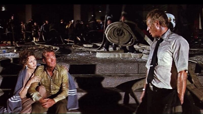 Faye Dunaway, Paul Newman and Steve McQueen in The Towering Inferno