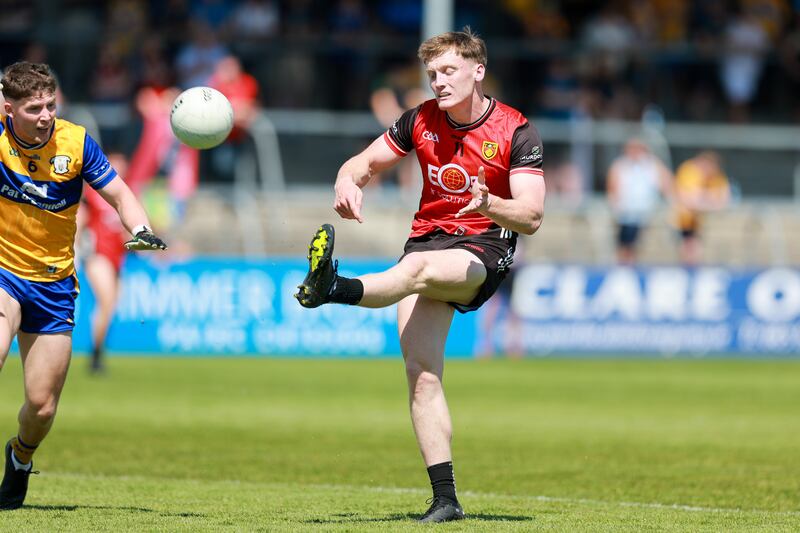 Odhran Murdock of Down goes for a score. Photograph: Natasha Barton/Inpho 
