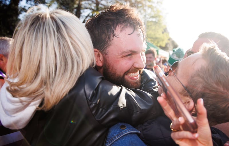 Terenure's Harrison Brewer celebrates with his mother Beverley Keegan and his uncle Jason Keegan after the semi-final victory over Lansdowne. Photograph: Tom Maher/Inpho