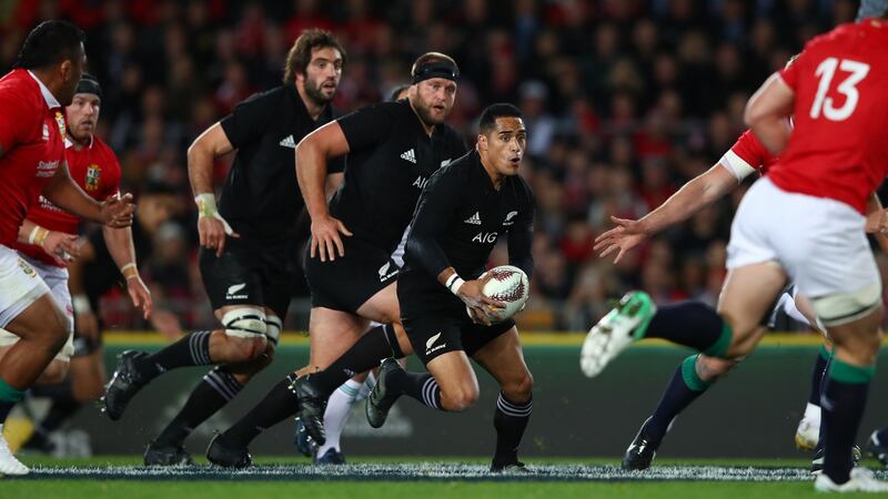 Aaron Smith   runs at the Lions during the first test match at Eden Park. Photo: Hannah Peters/Getty Images