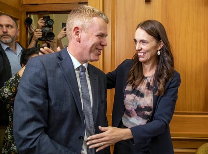 New Zealand's next prime minister Chris Hipkins with outgoing leader Jacinda Ardern. Photograph: AP