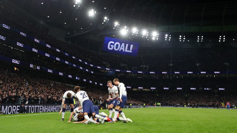 Heung-Min Son celebrates scoring the first goal at Tottenham’s new ground. Photograph: Catherine Ivill/Getty
