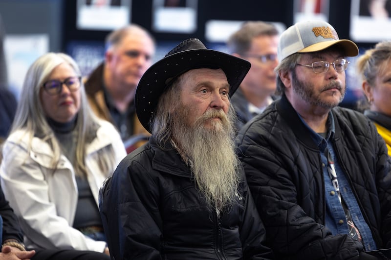 Observers listen as Wisconsin supreme court candidate Brad Schimel speaks during a campaign stop in Kronenwetter. Photograph: Scott Olson/Getty Images