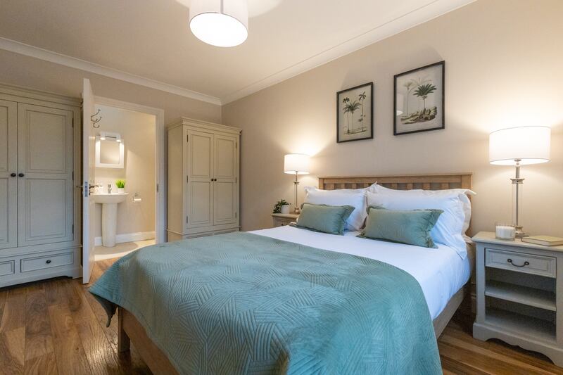 The principal bedroom has a smart, generous en suite with a roof light.