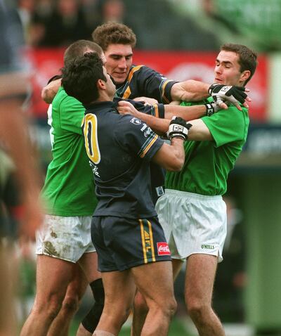 Irish and Australian players scuffle during the International Rules test in 2010. Photograph: Lorraine O'Sullivan/Inpho 