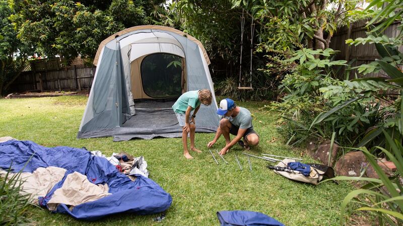 Real life Australian father and son set up the tent in their backyard during lockdown