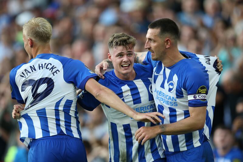 Evan Ferguson celebrates with Lewis Dunk and Jan Paul van Hecke after scoring the second of his three goals against Newcastle at the AMEX Stadium in Brighton, England. Photograph: Steve Bardens/Getty Images