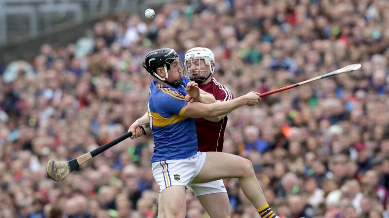 Galway’s Joe Canning tackles  Tipperary’s Dan McCormack during the league final.  Photograph: Morgan Treacy/Inpho