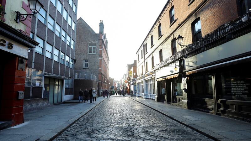 Deserted streets in Dublin’s Temple Bar after pubs closed to contain coronoavirus. Photograph: Lorraine O’Sullivan/Reuters