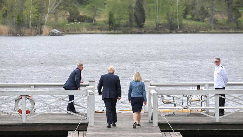 British prime minister Boris Johnson and Sweden’s prime minister Magdalena Andersson take a walk around the gardens at the retreat residence of the Swedish prime minister in Harpsund 120km west of Stockholm. Photograph: Jonathan Nackstrand/AFP via Getty Images