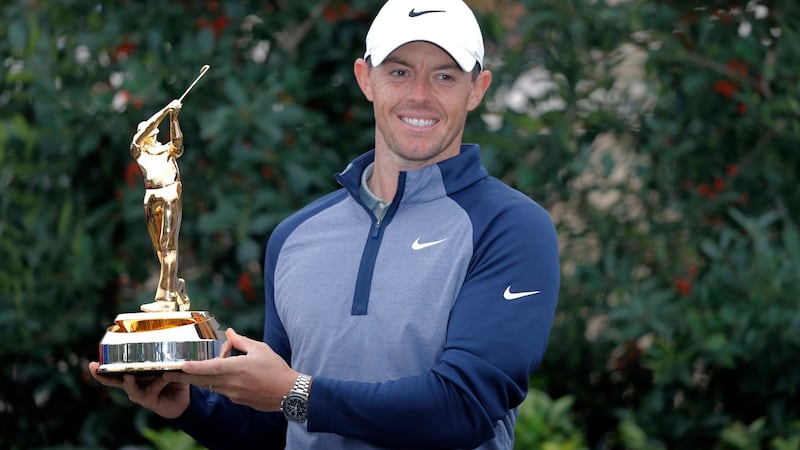 Rory McIlroy holds the trophy after winning The Players Championship on  Sunday. Photograph: Gerald Herbert/AP