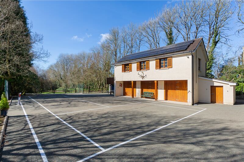 Stables and tennis court