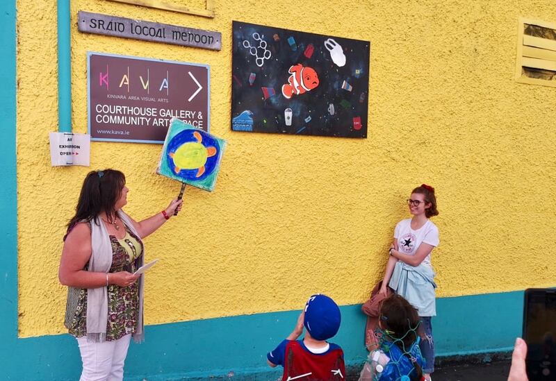 Dunne from Plastic-free Kinvara at the unveiling of one of three public awareness billboards created by Kinvara Youth Council teen artists, with artist Hazel McAndrews. Photograph: Louise O’Neill Vance