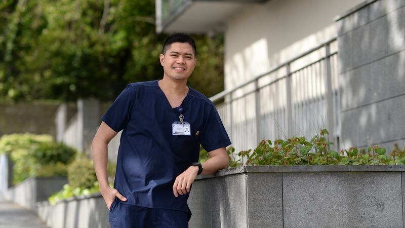 Rodvic Penas, a Filipino nurse, works at a major Dublin hospital, and came to Ireland three years ago. Photograph: Dara Mac Dónaill