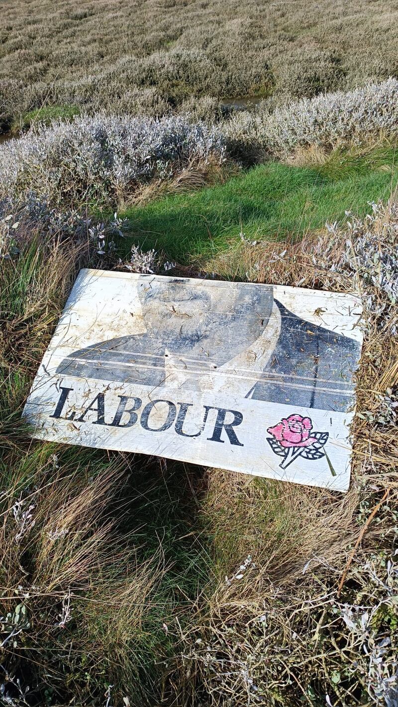 A torn election poster found in the seabed at Bull Island. Photograph: Brian Bolger