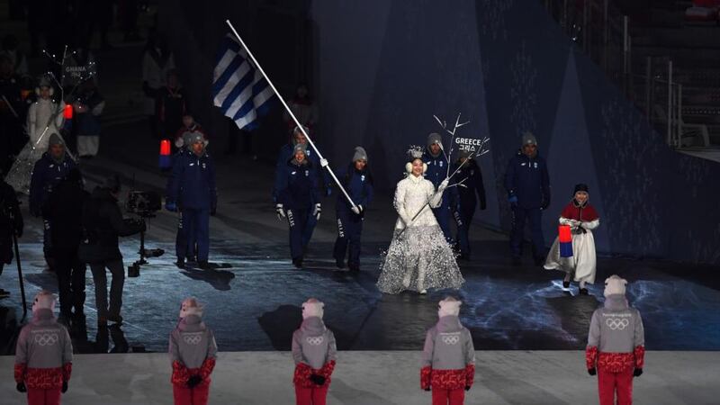 Flag bearer Sophia Ralli leads out Greece during the opening ceremony. Photo: Harry How/Getty Images