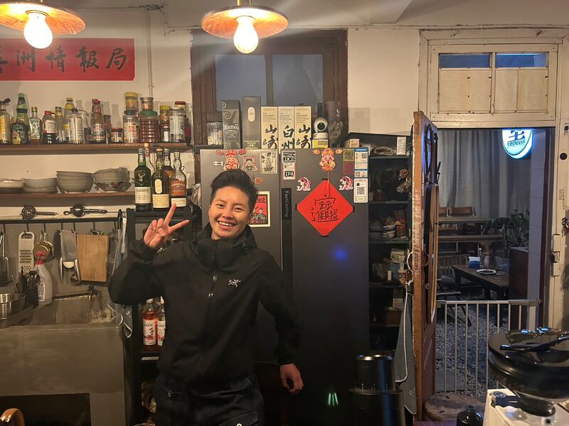 Xu Rui in her Man Cang Craft Beer bar in Xizhou: 'These days, there are just too many people moving here.' Photograph: Denis Staunton