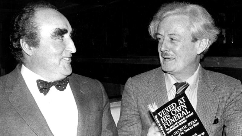 District judge Jim O’Sullivan with George Ryan in 1983. Ryan was the Irish Times bridge correspondent for 44 years. File photograph: Kevin McMahon
