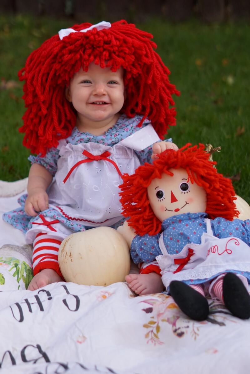 Natasha O’Neill’s first halloween, dressed up in her handmade Raggedy Ann costume.  Does this mean double treats and double sweets?