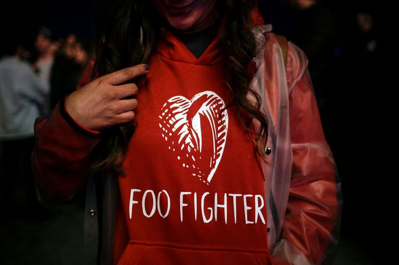 A  fan at the Estereo Picnic festival in Bogota, Colombia where Foo Fighters were due to perform on Friday prior the death of drummer Taylor Hawkins. Photograph: Juan Pablo Pino/AFP via Getty