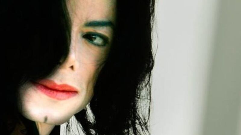 Michael Jackson: the late singer during his child-molestation trial in 2005. Photograph: Carlo Allegri/Getty