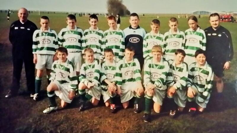 Roche poses with her team-mates at first club Valeview.